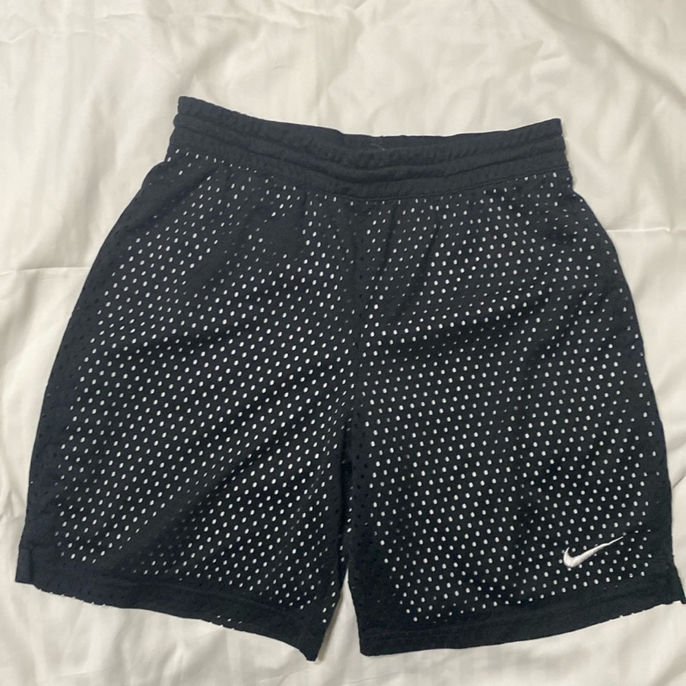 Nike dri-fit black/silver mesh shorts in girls size L.